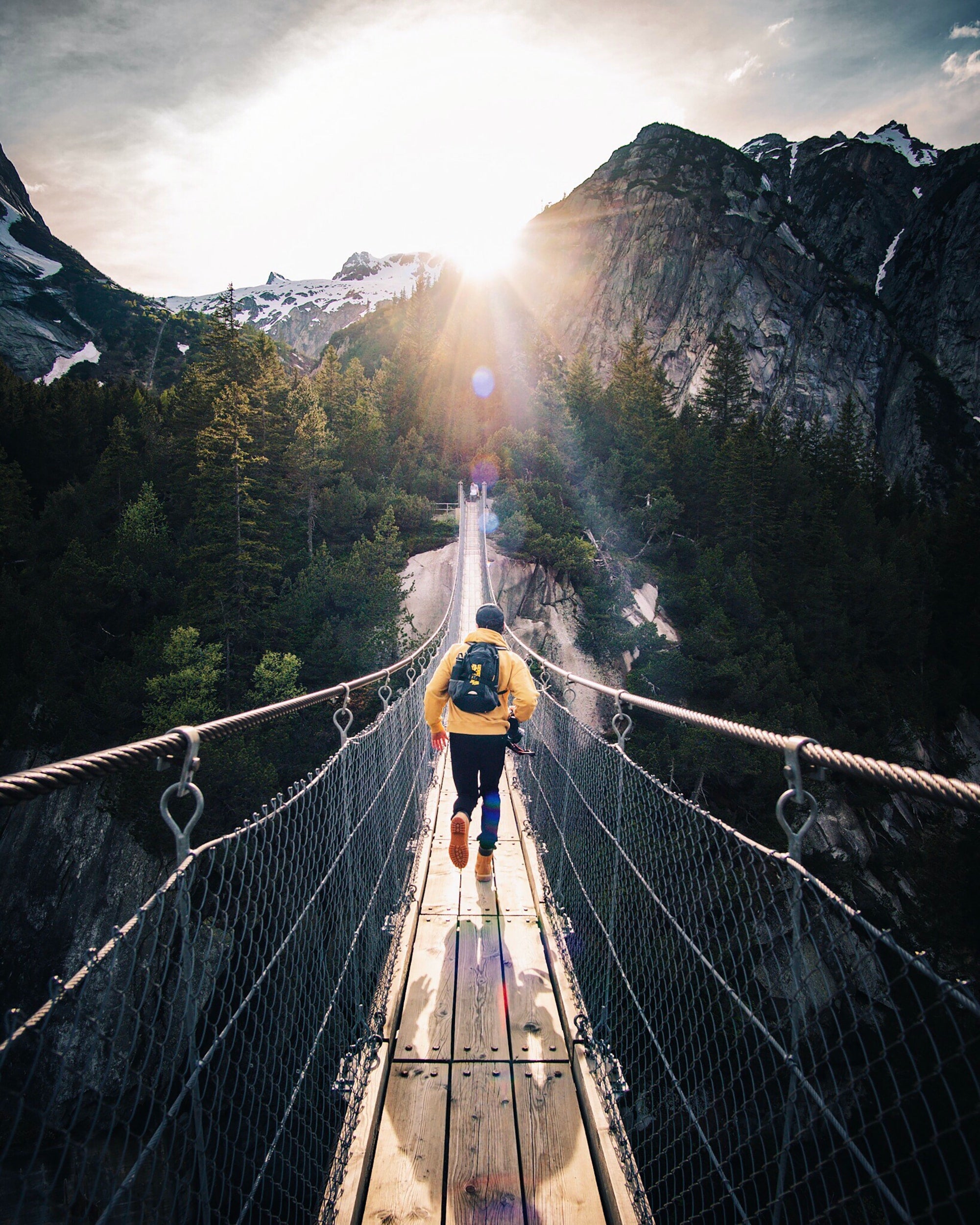 Hiker on a bridge
